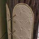 Panel-Stitched Leather Bed with Top Strap Details and High-Gloss Wooden Sides